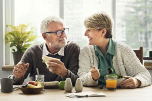 dental patients enjoying their meal with their new dental implants