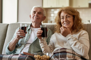 Dental Patients Eating And Drinking Using All-On-4 Dental Implants